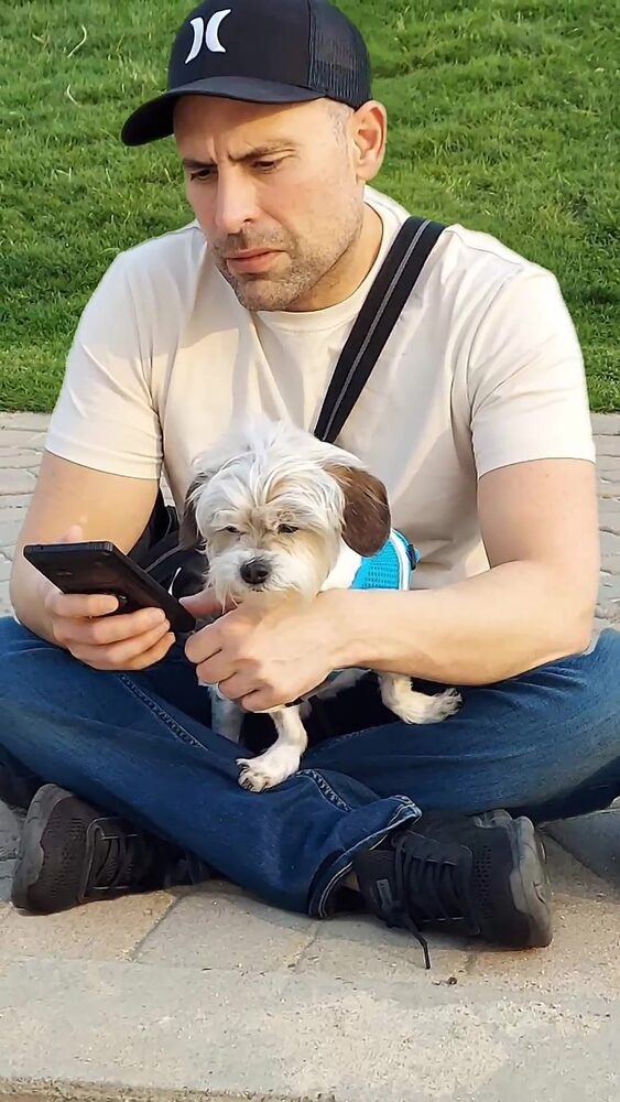Cliff, founder of Pet Pic Portraits, with one of the family dogs